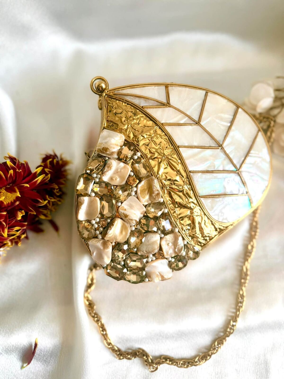 Gold and mother-of-pearl leaf clutch