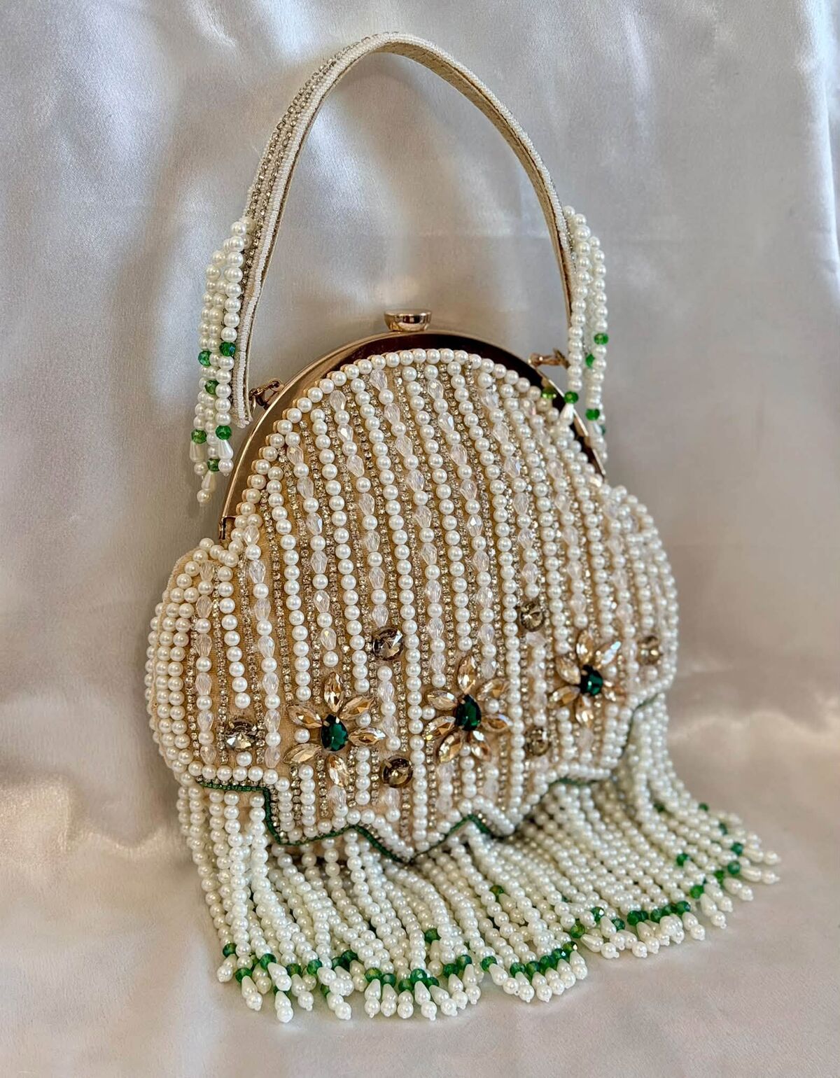 Pearl-beaded bag with tassel fringe